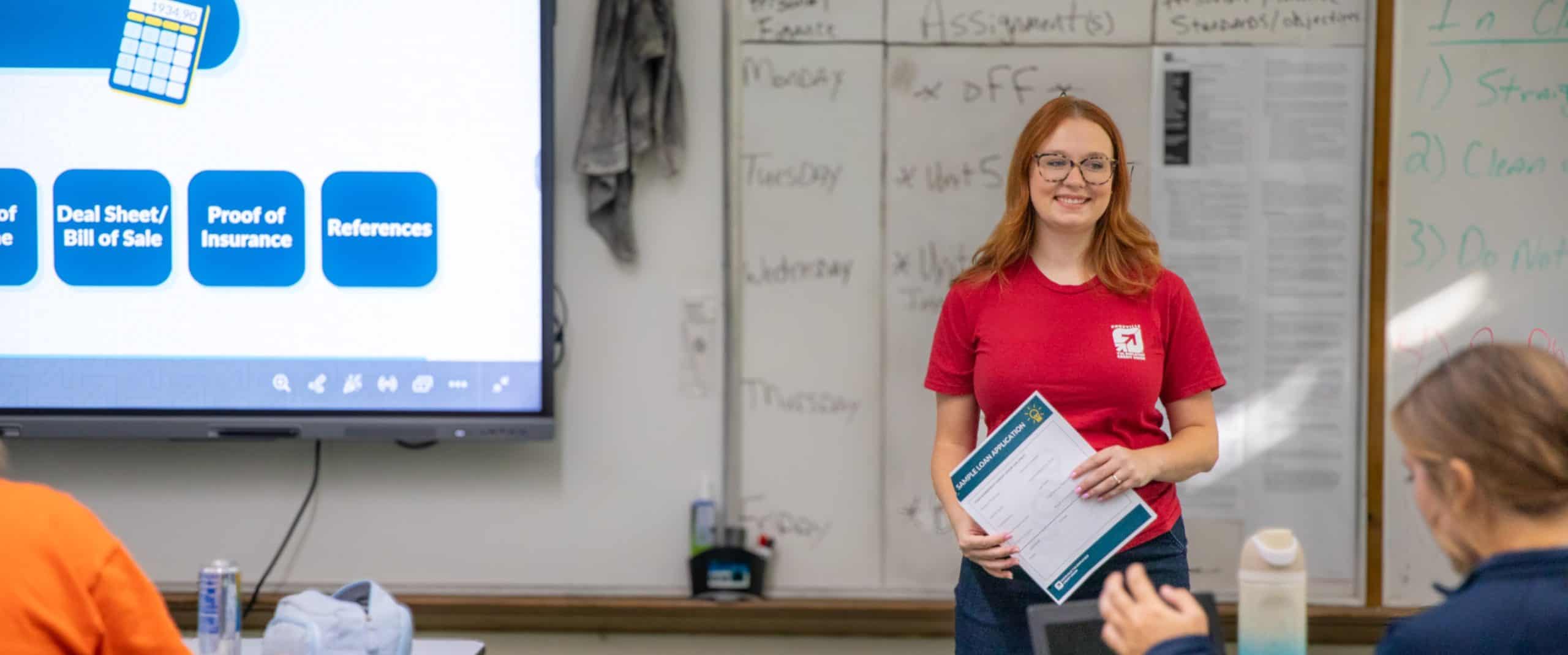 KTVAECU Employee standing in front of a classroom