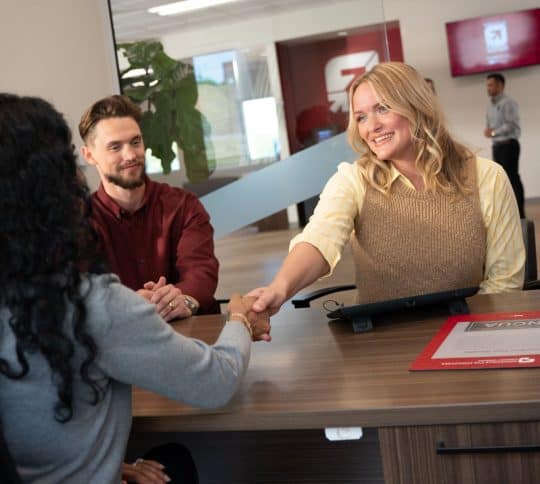 Young Couple applying for a home refinance loan