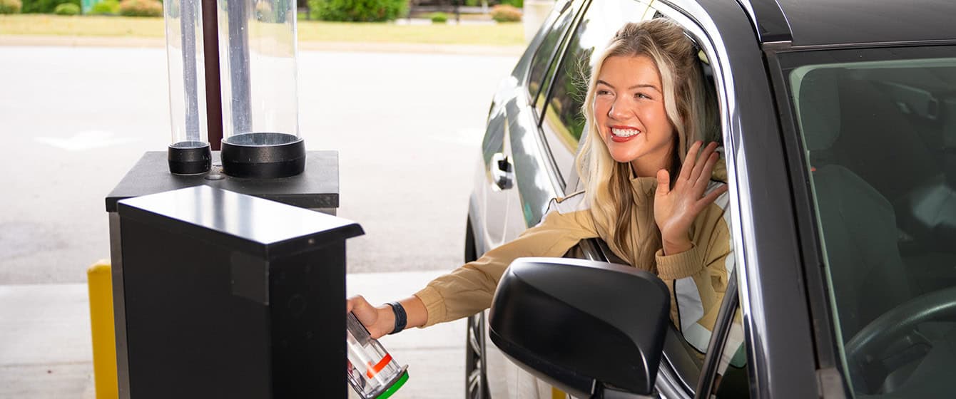 Woman going through drive through at KTVAECU branch